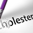 Eraser deleting the word Cholesterol